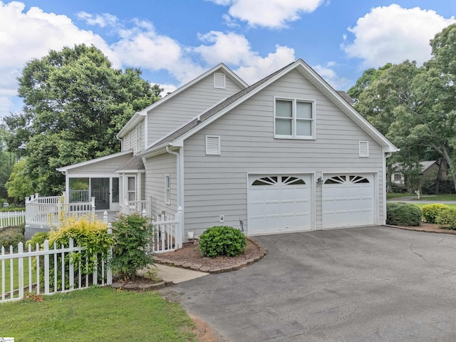 209 Thornhill Dr, Spartanburg, SC 29301 - view of side of property featuring asphalt driveway and an attached garage