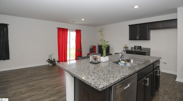 1421 Trotting Ave, Roebuck, SC 29376 - kitchen with dishwasher, light stone countertops, dark wood finished floors, recessed lighting, and an island with sink