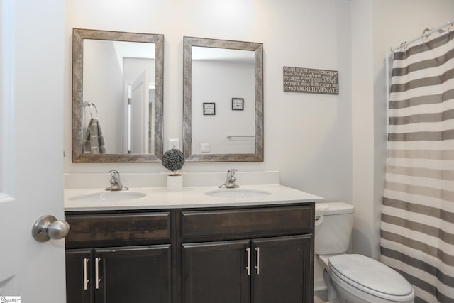 1421 Trotting Ave, Roebuck, SC 29376 - full bathroom with double vanity and toilet