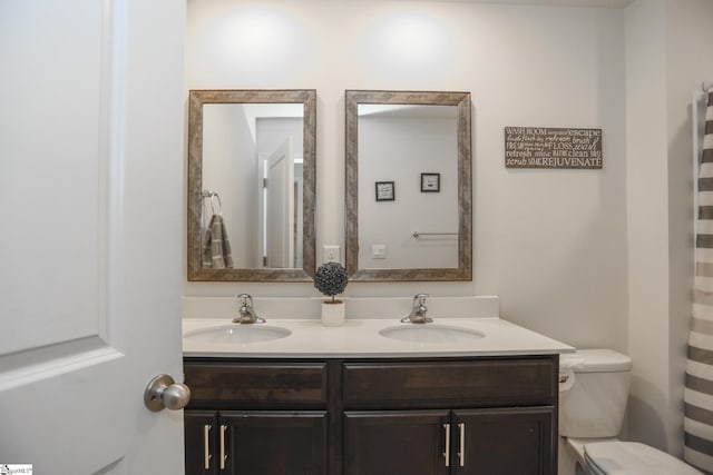1421 Trotting Ave, Roebuck, SC 29376 - full bathroom featuring double vanity and toilet