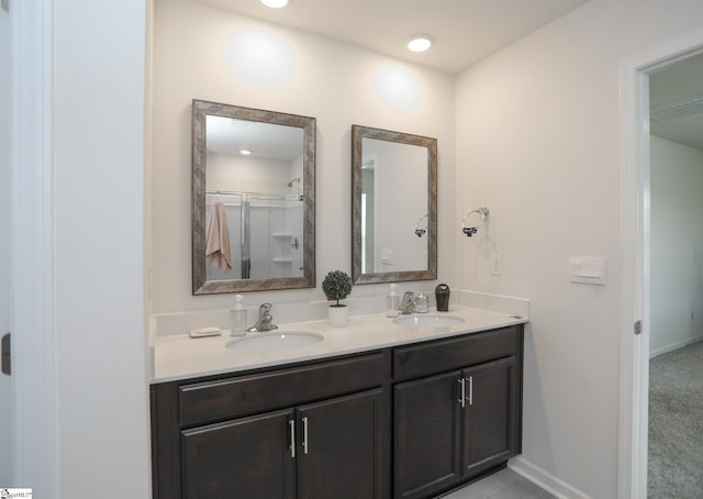 1421 Trotting Ave, Roebuck, SC 29376 - bathroom with double vanity and a shower