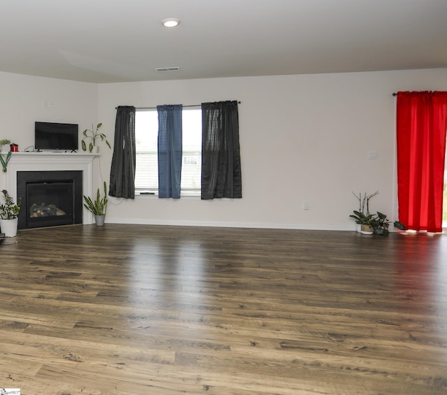 1421 Trotting Ave, Roebuck, SC 29376 - unfurnished living room featuring wood finished floors, a fireplace, and recessed lighting