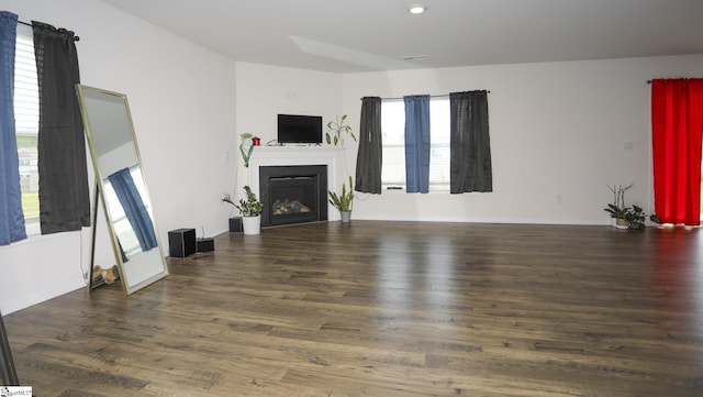 1421 Trotting Ave, Roebuck, SC 29376 - unfurnished living room featuring plenty of natural light, wood finished floors, a fireplace, and recessed lighting