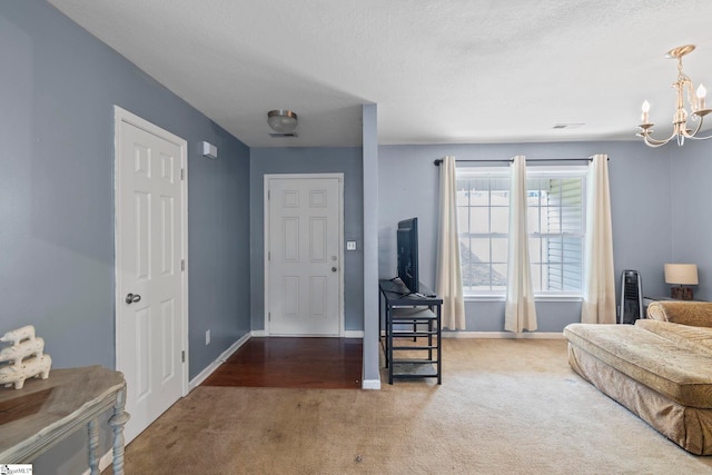 125 Woodgrove Way, Greer, SC 29651 - foyer with carpet floors and a chandelier