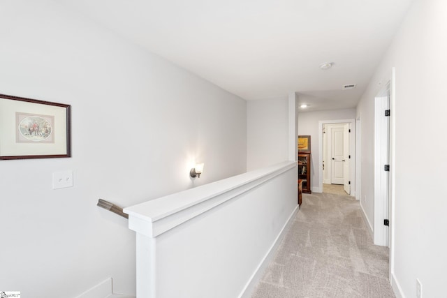 27 Mossycup Rd, Taylors, SC 29687 - corridor with light carpet and an upstairs landing