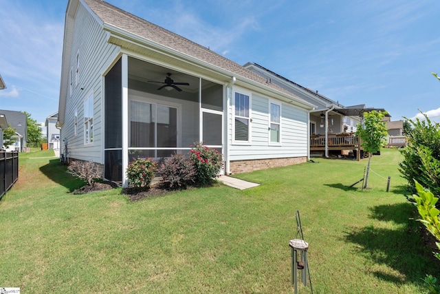 27 Mossycup Rd, Taylors, SC 29687 - back of property with a lawn and ceiling fan