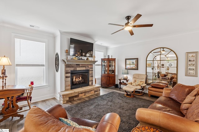 27 Mossycup Rd, Taylors, SC 29687 - living area with ornamental molding, ceiling fan, wood finished floors, and a fireplace