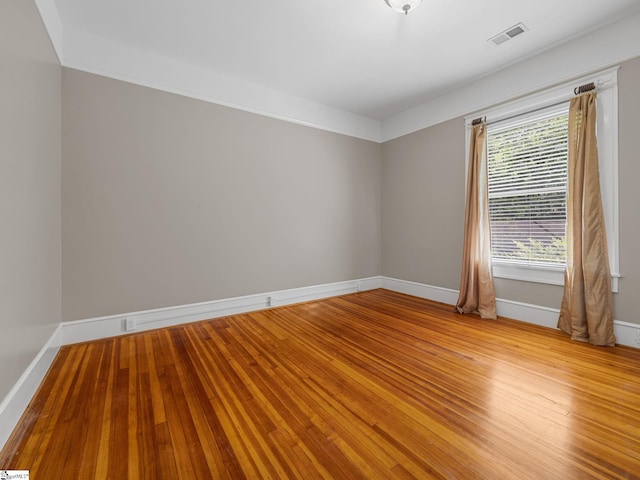 772 Glendalyn Ave, Spartanburg, SC 29302 - spare room with baseboards and light wood-type flooring