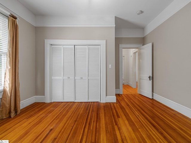 772 Glendalyn Ave, Spartanburg, SC 29302 - unfurnished bedroom featuring a closet and light wood-style floors