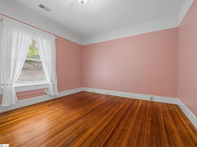 772 Glendalyn Ave, Spartanburg, SC 29302 - spare room featuring baseboards and wood finished floors