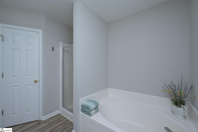 112 Pendock Ln, Piedmont, SC 29673 - full bathroom featuring a bath, wood finished floors, and a shower stall