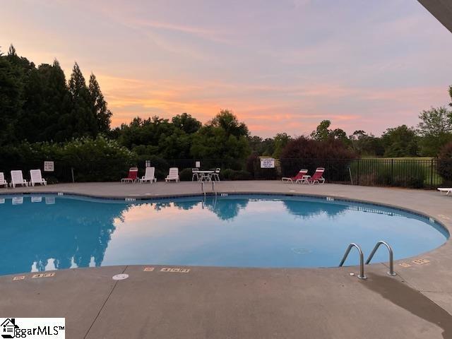 112 Pendock Ln, Piedmont, SC 29673 - community pool featuring a patio area and view of wooded area