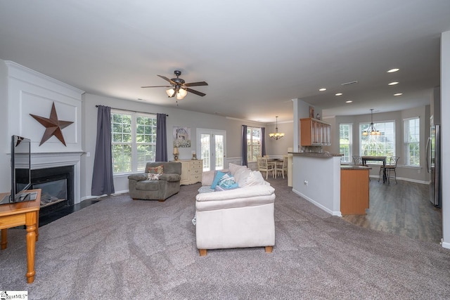112 Pendock Ln, Piedmont, SC 29673 - living area with a chandelier, a fireplace with flush hearth, carpet, recessed lighting, and a ceiling fan