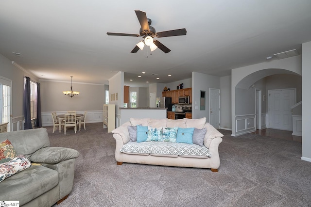 112 Pendock Ln, Piedmont, SC 29673 - living room with a chandelier, carpet, arched walkways, a ceiling fan, and a decorative wall