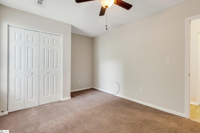 21 Lantern Ln, Greer, SC 29651 - unfurnished bedroom with carpet floors, a closet, and a ceiling fan