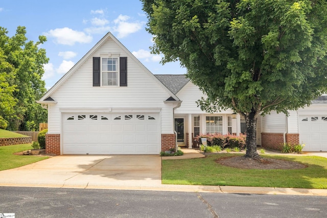 25 Cedar Rock Dr, Greer, SC 29650 - traditional home featuring brick siding, driveway, and a garage