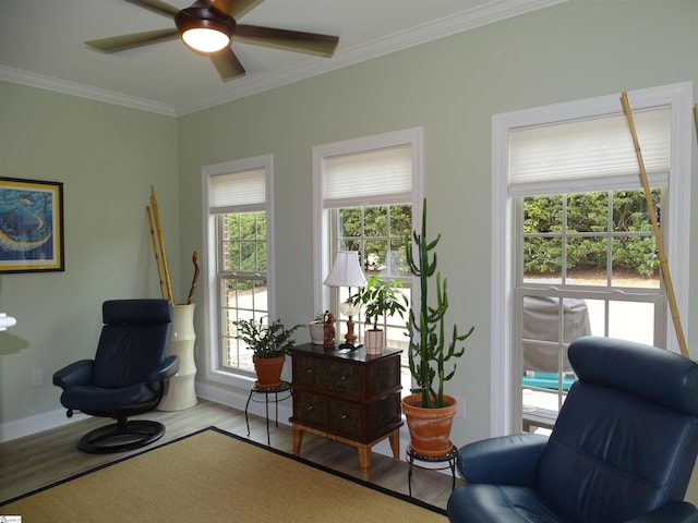 811 White Magnolia Dr, Inman, SC 29349 - living area with wood finished floors, crown molding, and a ceiling fan