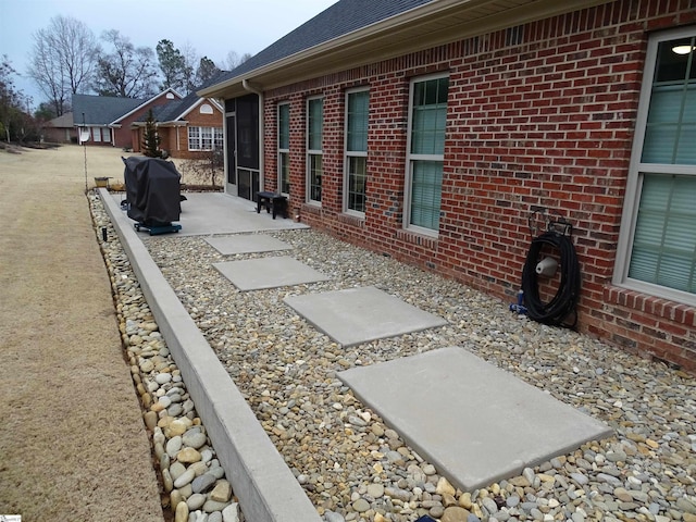 811 White Magnolia Dr, Inman, SC 29349 - view of side of property with brick siding and a patio