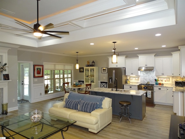 811 White Magnolia Dr, Inman, SC 29349 - living area with light wood finished floors, ceiling fan, ornamental molding, and recessed lighting