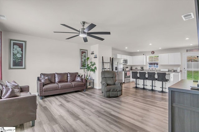 243 Lily Park Way, Easley, SC 29642 - living area with light wood-style flooring, ceiling fan, and recessed lighting