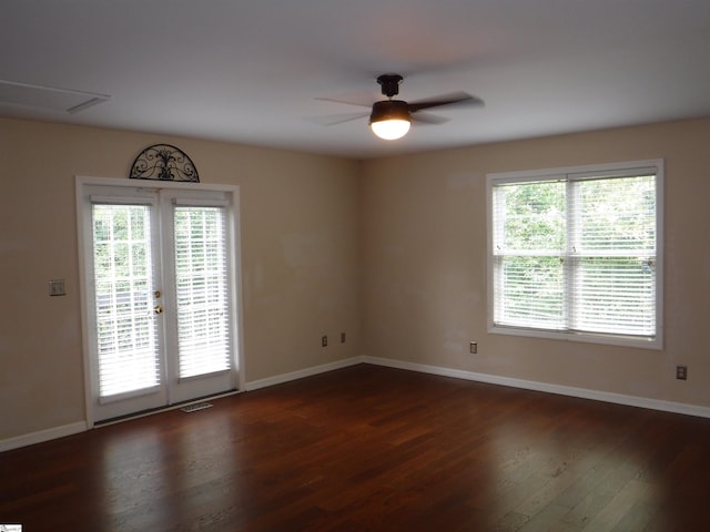 279 Finch Rd, Wellford, SC 29385 - spare room featuring dark wood-style flooring, french doors, and a ceiling fan