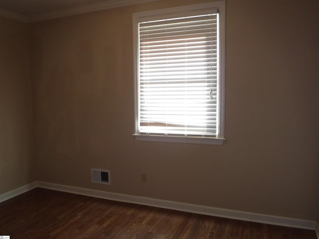 279 Finch Rd, Wellford, SC 29385 - empty room featuring crown molding and dark wood finished floors