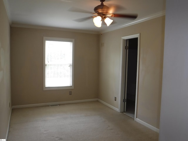 279 Finch Rd, Wellford, SC 29385 - unfurnished room featuring ornamental molding, ceiling fan, and light carpet