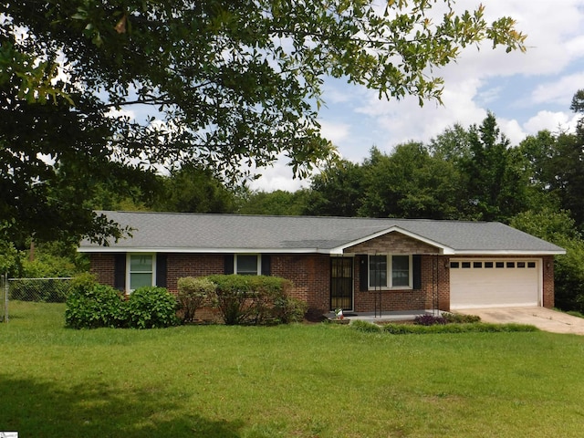 279 Finch Rd, Wellford, SC 29385 - ranch-style house with brick siding, a garage, and concrete driveway