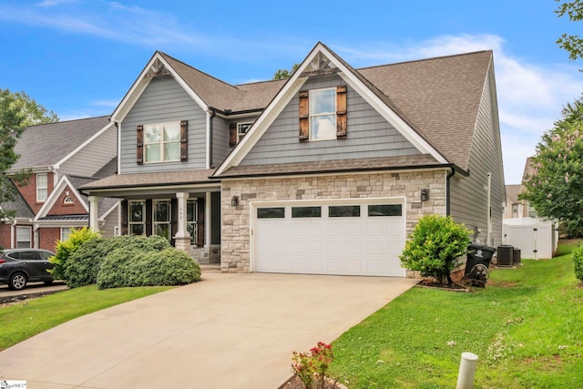 542 Drayton Hall Blvd, Duncan, SC 29334 - craftsman-style home featuring a front yard, a shingled roof, concrete driveway, and stone siding