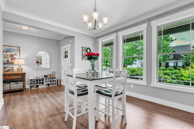 542 Drayton Hall Blvd, Duncan, SC 29334 - dining room with a chandelier, healthy amount of natural light, ornamental molding, and wood finished floors