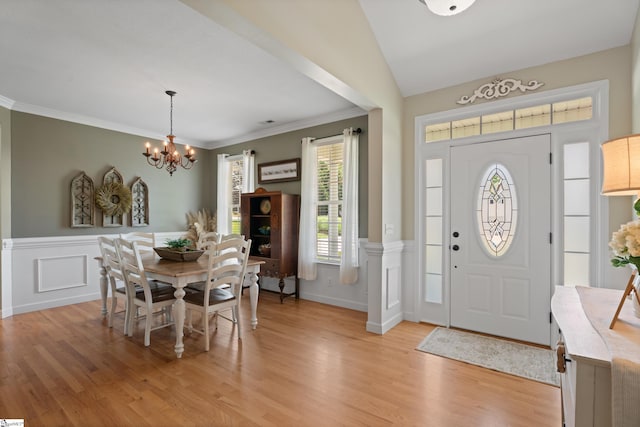 104 Superior Way, Greer, SC 29651 - foyer featuring a chandelier, light wood-type flooring, a wainscoted wall, crown molding, and a decorative wall
