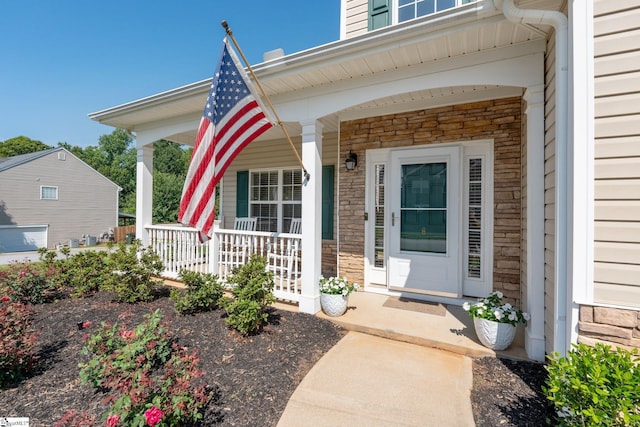 6 Castle Hall Ct, Simpsonville, SC 29681 - property entrance featuring a porch and stone siding