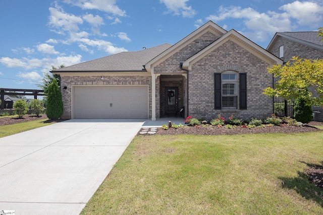 15 Lifestyle Ct, Greer, SC 29650 - ranch-style house featuring a garage, driveway, a front lawn, and brick siding