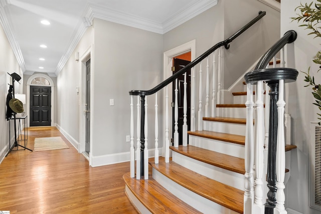 623 N Main St Unit Iii, Unit Iii, Greenville, SC 29601 - foyer featuring recessed lighting, wood finished floors, stairs, and crown molding