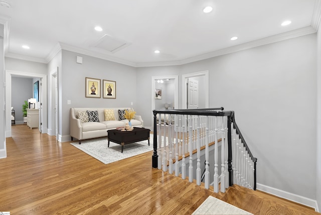 623 N Main St Unit Iii, Unit Iii, Greenville, SC 29601 - living room with light wood-style flooring, recessed lighting, crown molding, and attic access
