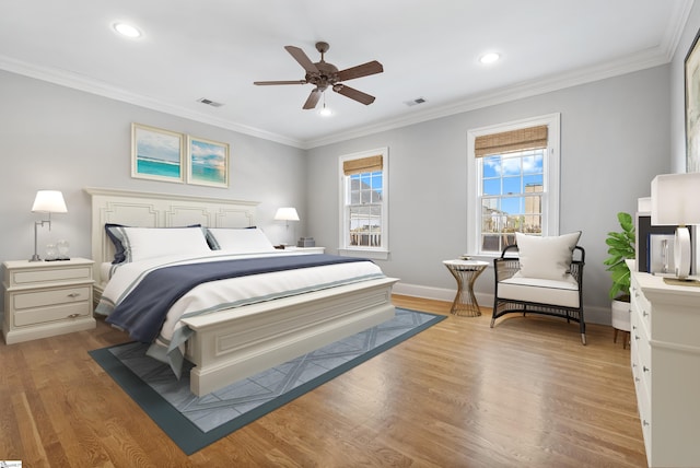 623 N Main St Unit Iii, Unit Iii, Greenville, SC 29601 - bedroom with light wood finished floors, recessed lighting, crown molding, and a ceiling fan