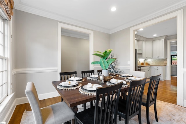 623 N Main St Unit Iii, Unit Iii, Greenville, SC 29601 - dining space with light wood-type flooring, ornamental molding, and recessed lighting