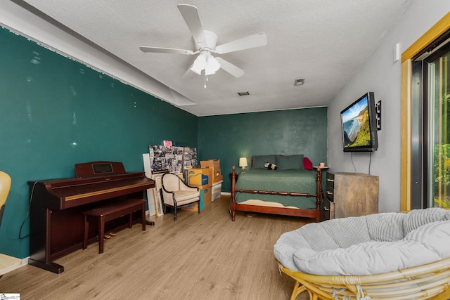 2701 Cobbs Way, Anderson, SC 29621 - bedroom featuring wood finished floors, a textured ceiling, and ceiling fan