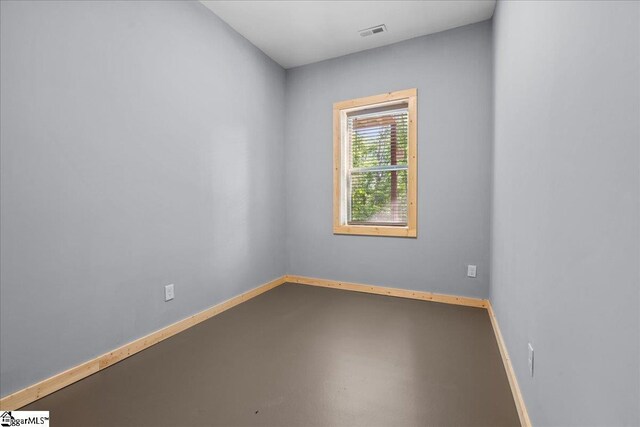 1150 Chinquapin Rd, Travelers Rest, SC 29690 - unfurnished room with finished concrete flooring and baseboards