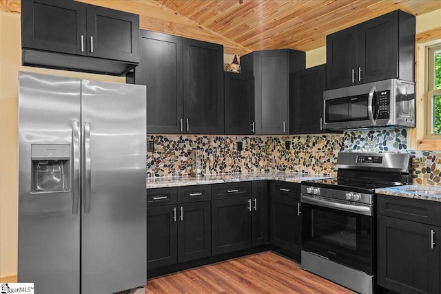 1150 Chinquapin Rd, Travelers Rest, SC 29690 - kitchen featuring appliances with stainless steel finishes, wood ceiling, dark cabinetry, light wood finished floors, and vaulted ceiling