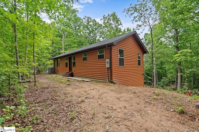 1150 Chinquapin Rd, Travelers Rest, SC 29690 - view of home's exterior featuring log veneer siding and entry steps