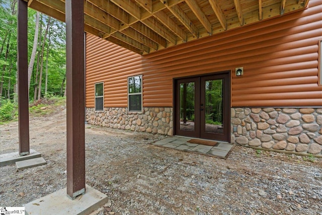 1150 Chinquapin Rd, Travelers Rest, SC 29690 - doorway to property featuring french doors, stone siding, and faux log siding