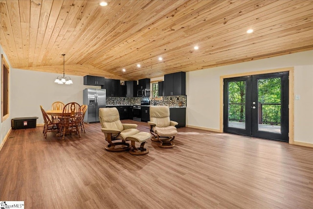 1150 Chinquapin Rd, Travelers Rest, SC 29690 - living room with wooden ceiling, vaulted ceiling, light wood-type flooring, a chandelier, and french doors