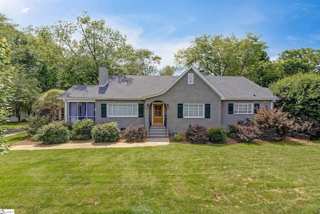 2109 Hudson Rd, Greer, SC 29650 - view of front of property featuring a front yard, a chimney, and brick siding