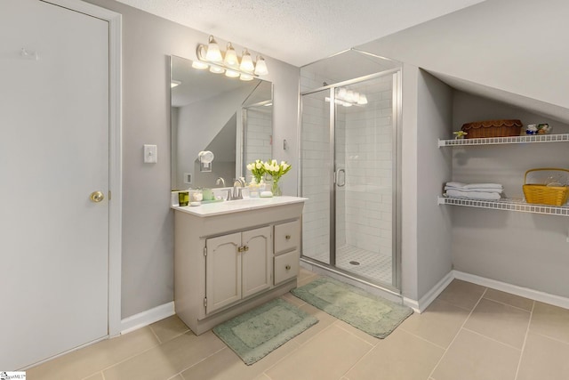 2109 Hudson Rd, Greer, SC 29650 - full bathroom with vanity, a shower stall, tile patterned floors, and a textured ceiling