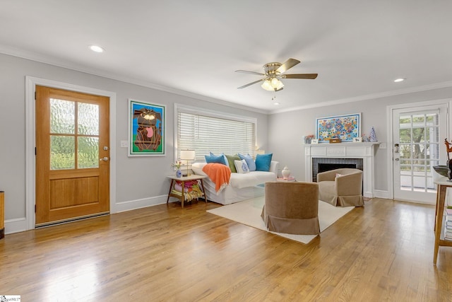 2109 Hudson Rd, Greer, SC 29650 - living room with crown molding, wood finished floors, ceiling fan, a fireplace, and recessed lighting
