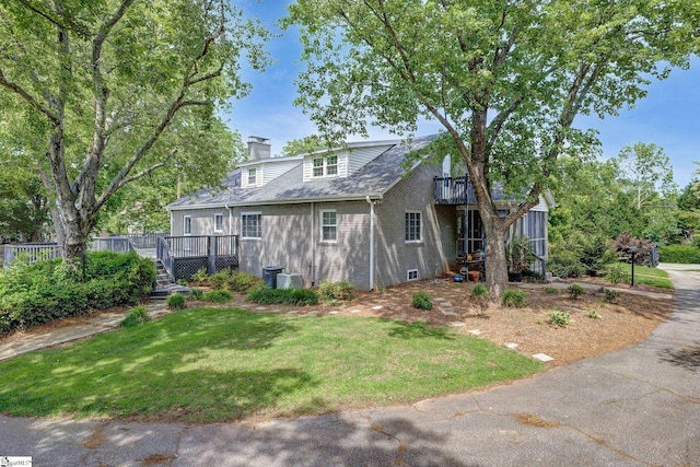 2109 Hudson Rd, Greer, SC 29650 - rear view of property with brick siding, stairway, a chimney, a yard, and a deck