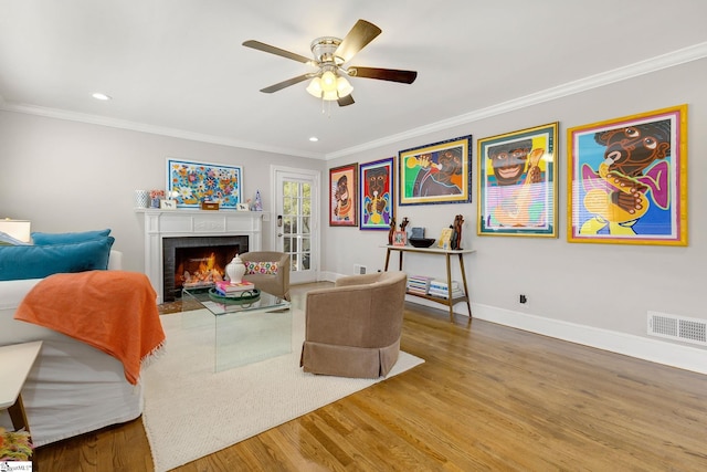 2109 Hudson Rd, Greer, SC 29650 - living room with wood finished floors, crown molding, a fireplace, ceiling fan, and recessed lighting