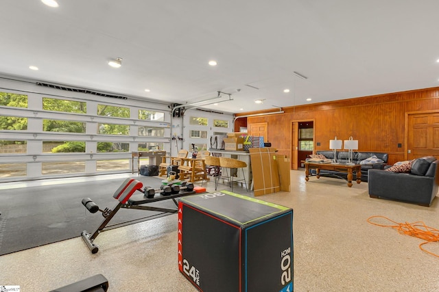 2109 Hudson Rd, Greer, SC 29650 - living room featuring wooden walls, a garage, and recessed lighting