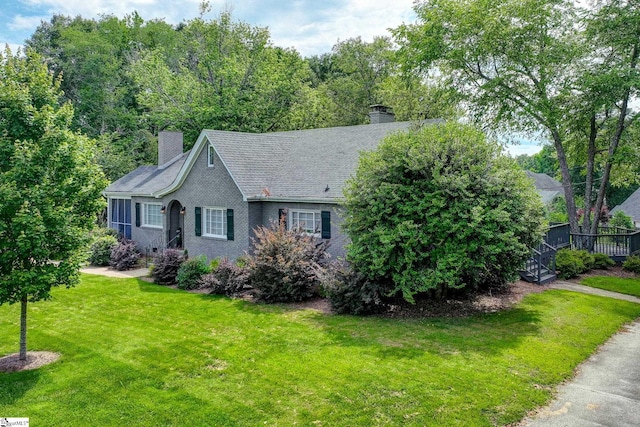 2109 Hudson Rd, Greer, SC 29650 - view of front of home featuring a chimney and a front lawn